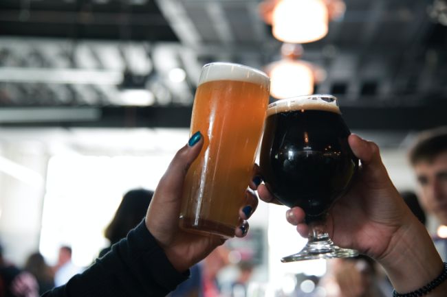 Glass Filled Light And Dark Beer.