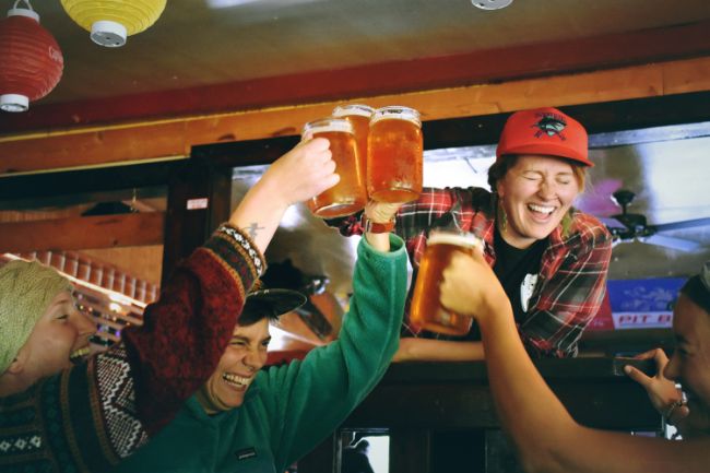 Friends Partying together With Beers.