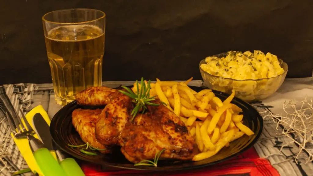 Bar-b-qued Chicken And Fries,  A Side of Potato Salad With Homemade Lemon Beer.
