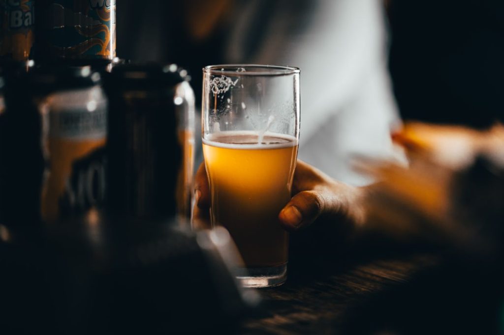 Holding A Glass of India Pale Ales.